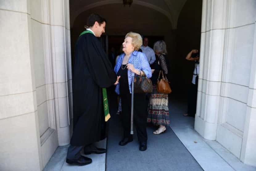 
The Rev. Bryan Dunagan greets church member Sandra Rose after his first service as senior...