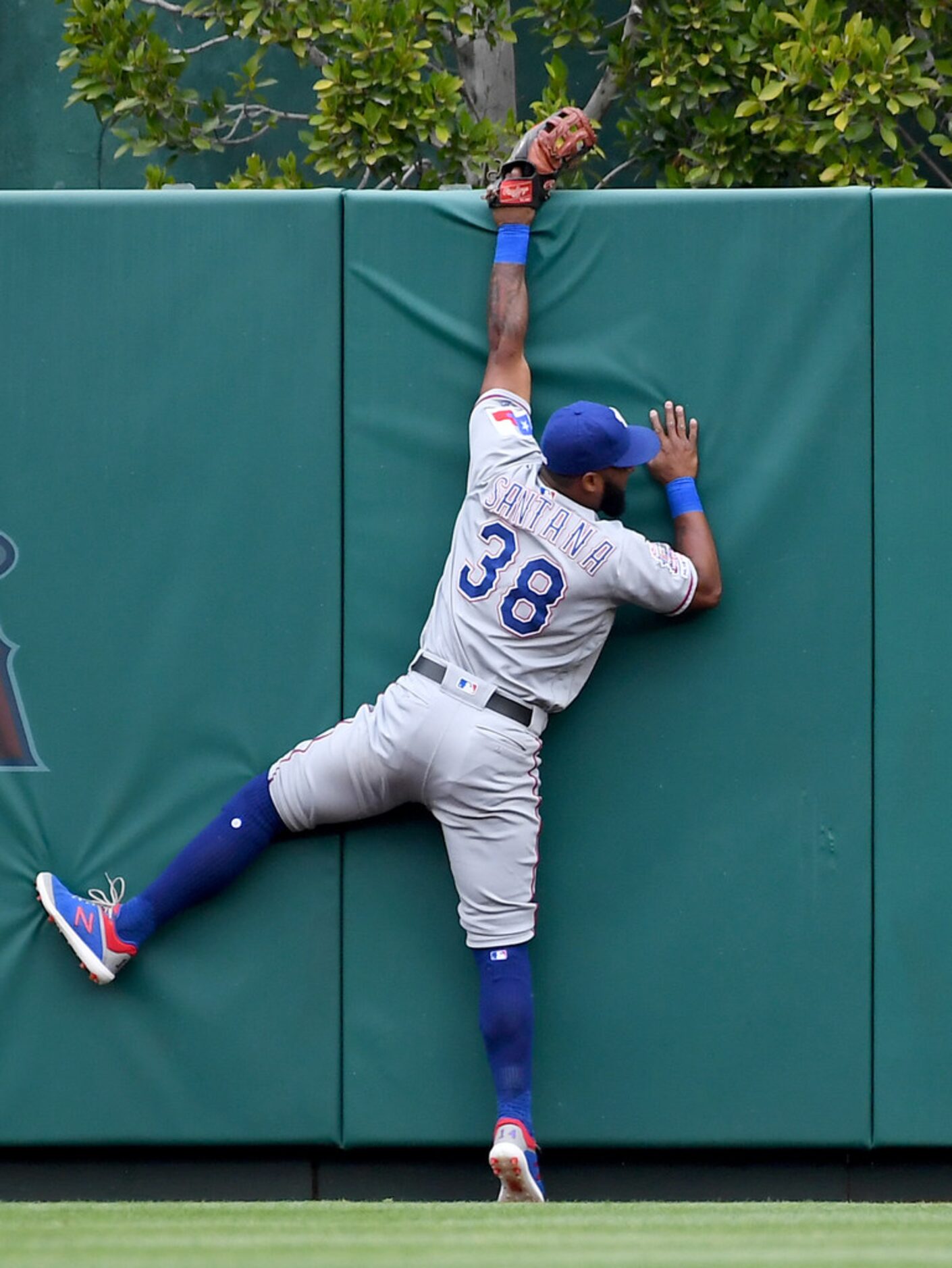 ANAHEIM, CA - MAY 26: Danny Santana #38 of the Texas Rangers can't reach the solo home run...