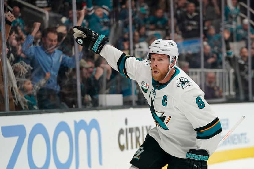 FILE - In this Dec. 22, 2018, file photo, San Jose Sharks center Joe Pavelski (8) celebrates...