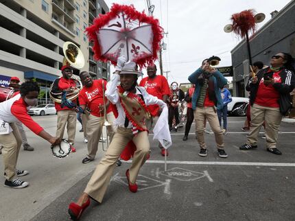 "¡Soltar!" grandmaster and choreographer Michelle Gibson backed by the Big Easy Brass Band.