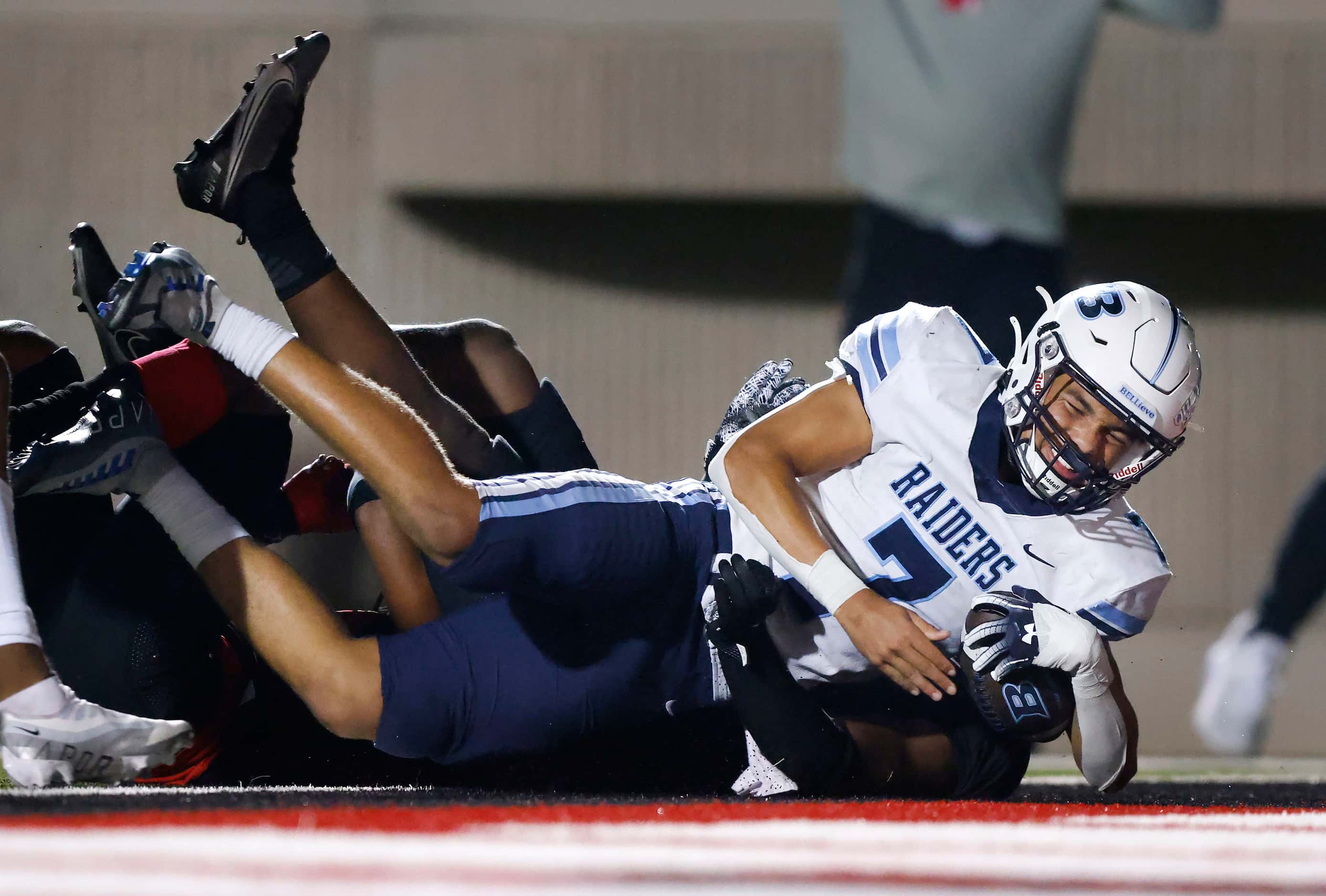 Hurst L.D. Bell quarterback Maddox Olatunde (7) broke several tackles and dragged Euless...