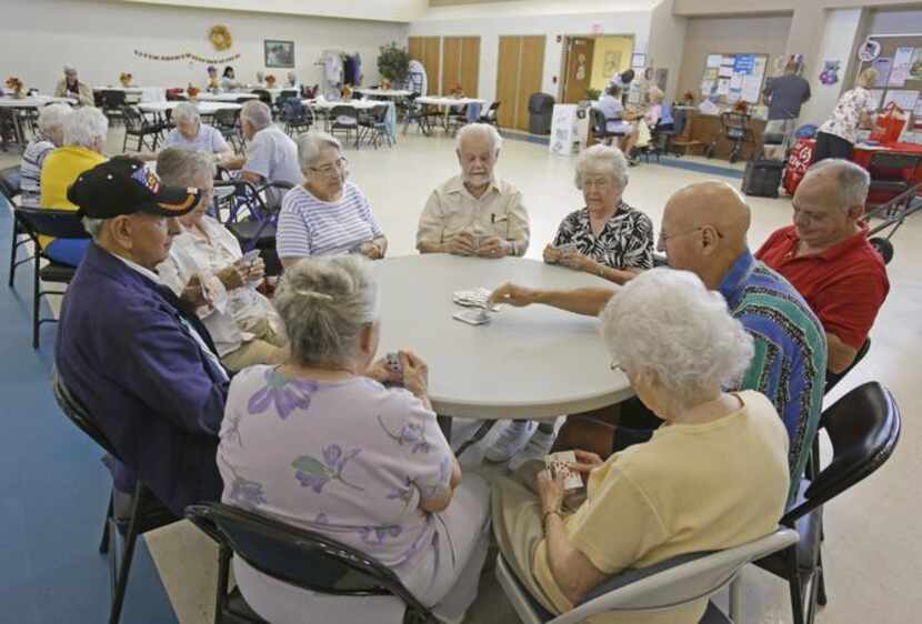 
Retired senior citizens gather for cards at the Citrus County Resource Center in Lecanto,...