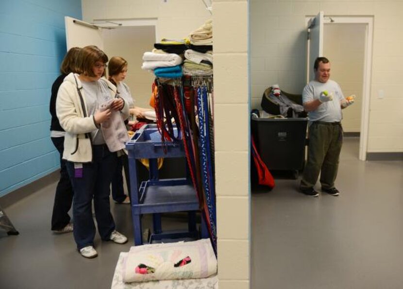 
Special education students (from left) Kenzie Arlege, Lacey Bryant and Michael Grimes...