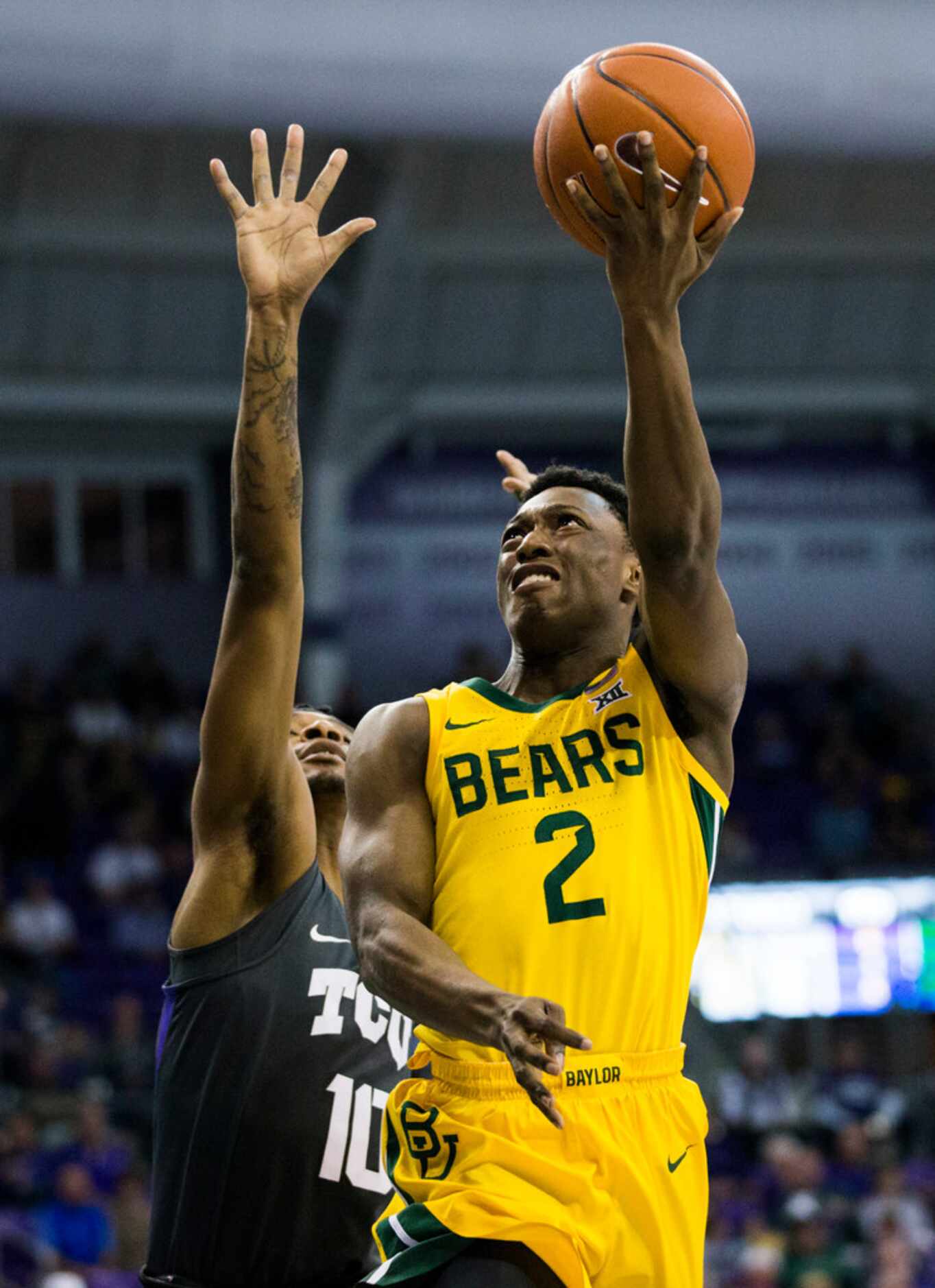 Baylor Bears guard Devonte Bandoo (2) takes a shot ahead of TCU Horned Frogs forward Diante...