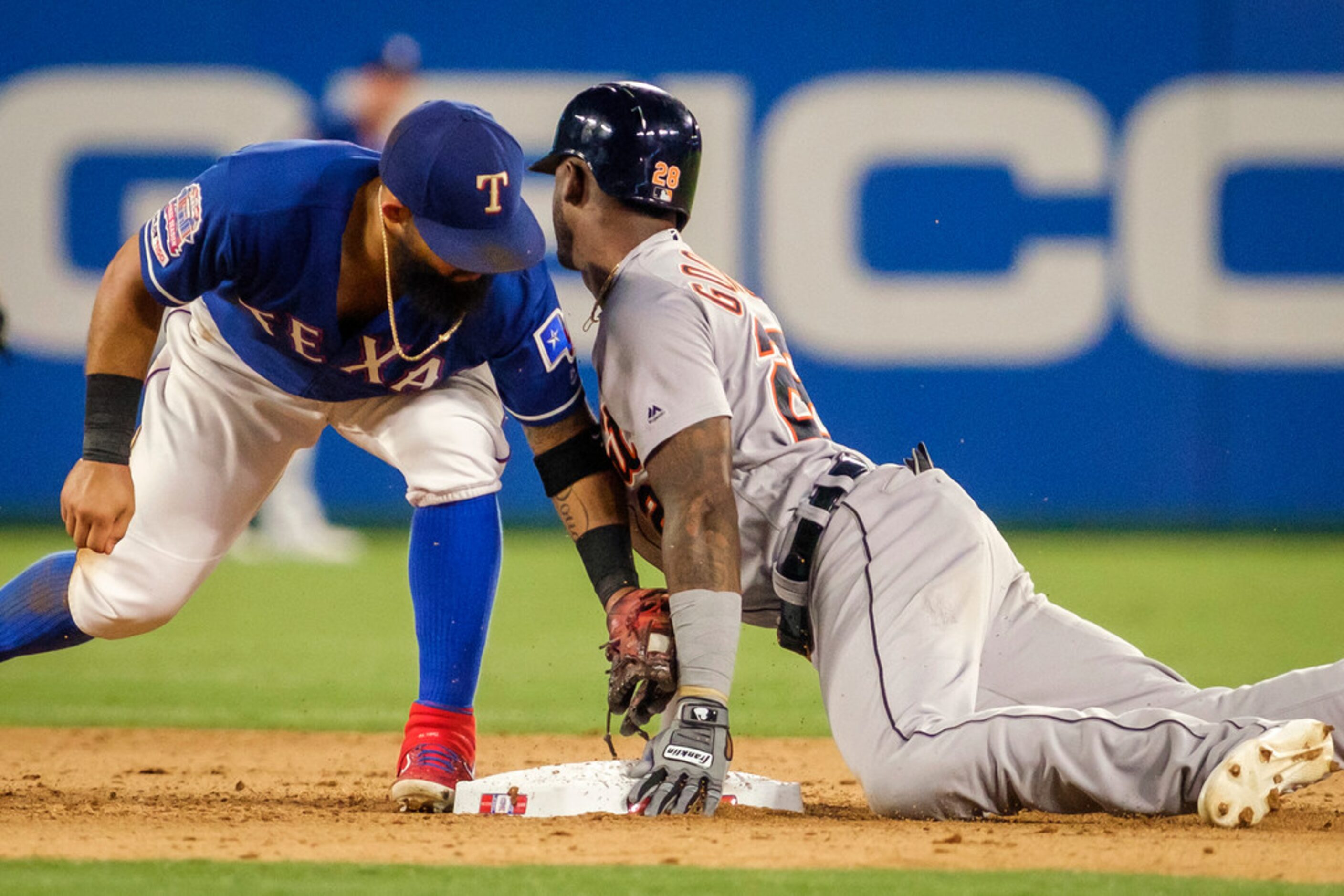 Detroit Tigers second baseman Niko Goodrum is safe at second with a double ahead of the tag...