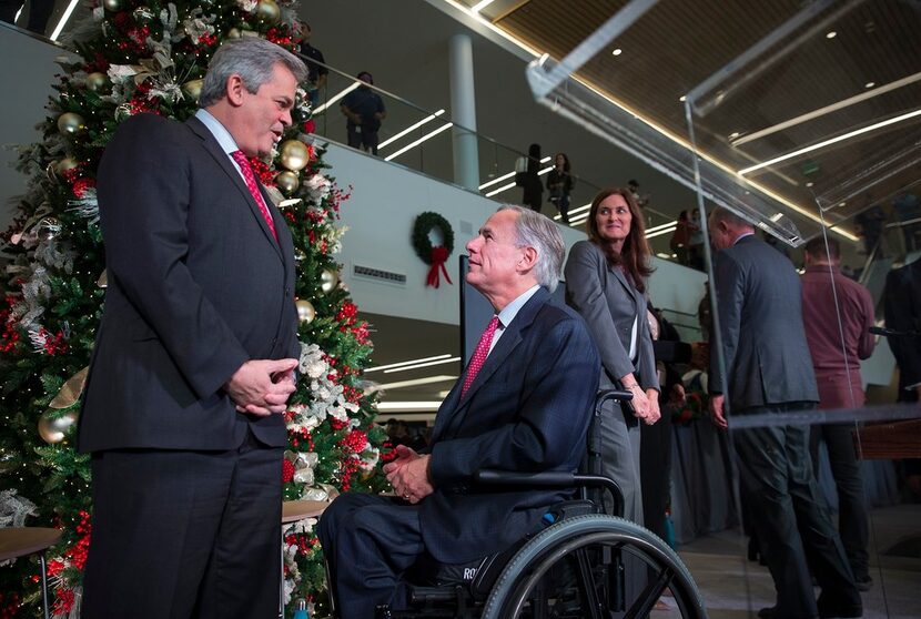 Austin Mayor Steve Adler (left, with Gov. Greg Abbott at Apple's announcement of a new...