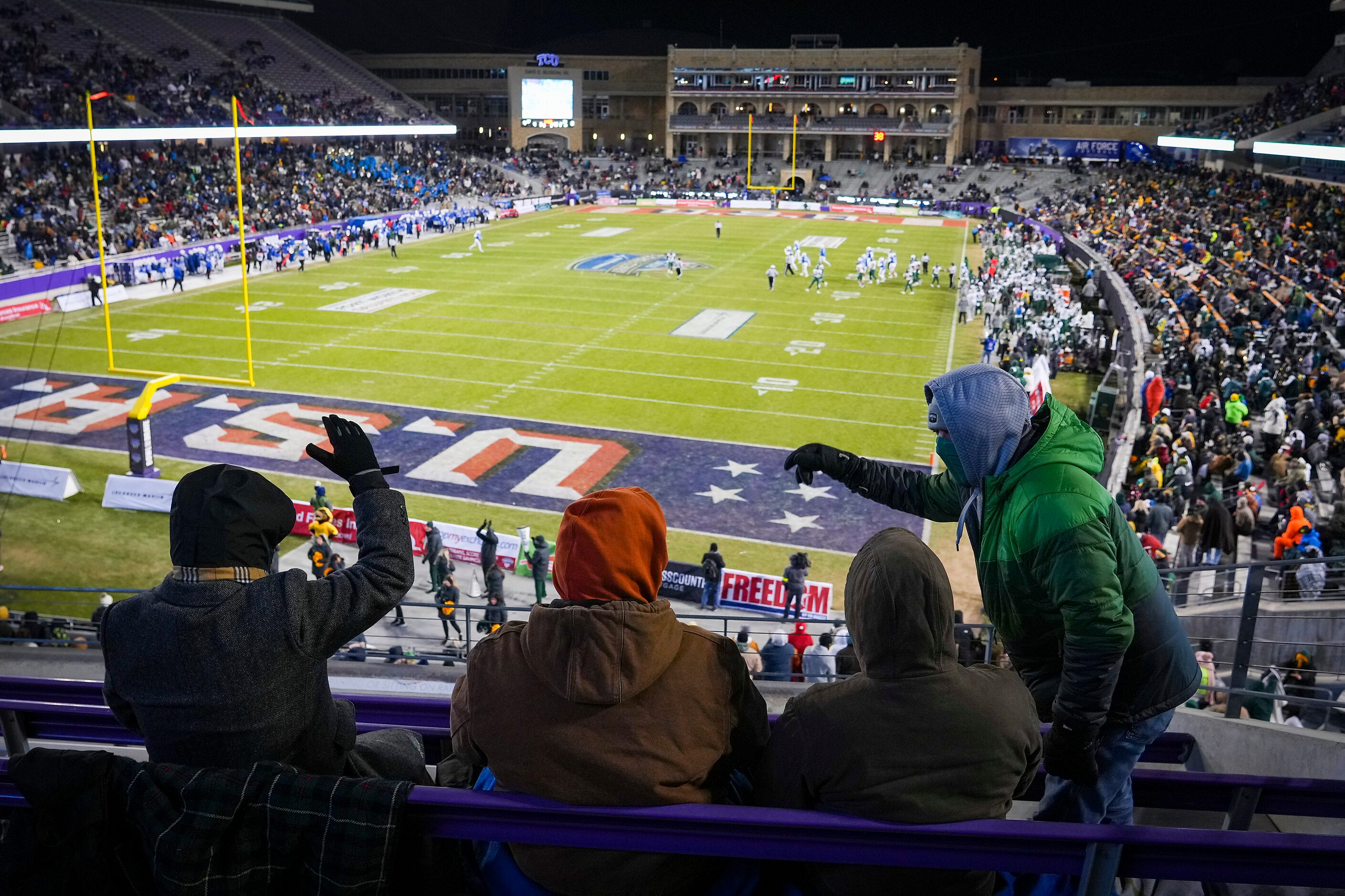 Baylor fans cheer a Bears first down during the first half of the Armed Forces Bowl NCAA...