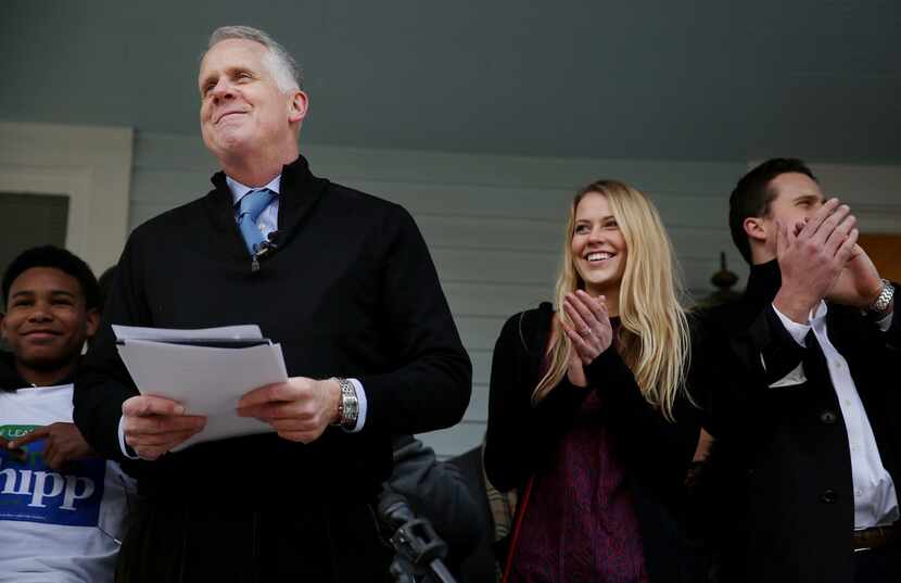 Longtime television reporter Brett Shipp, standing next to his children Katherine Shipp and...