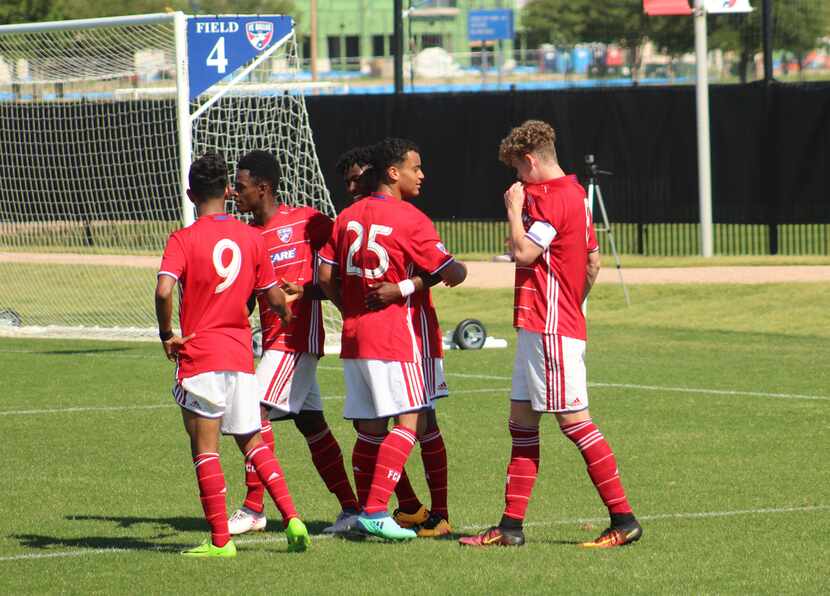 The FCD U19s celebrate Emmanuel Paga's goal in the second half of action against Solar SC....