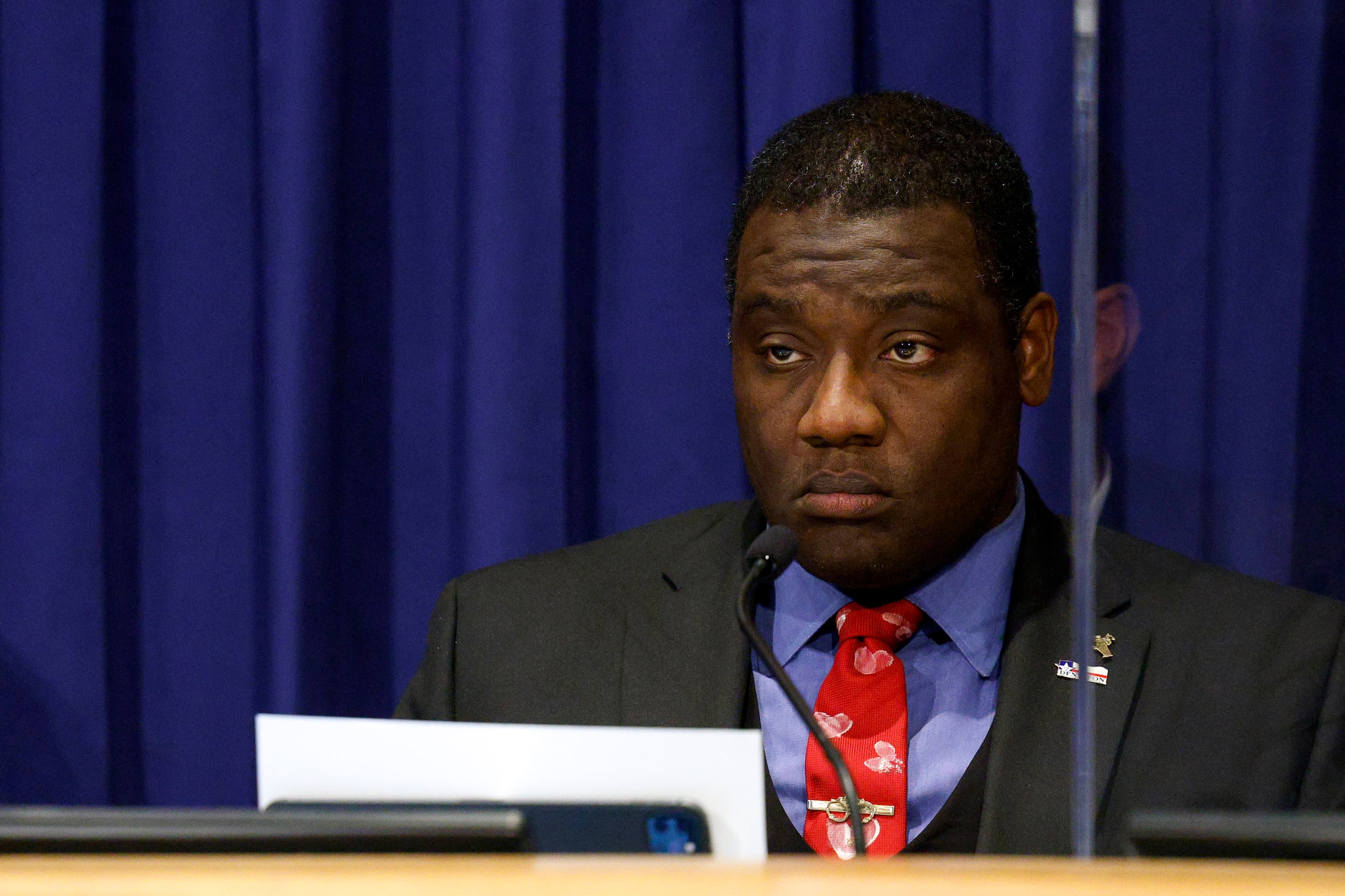 Denton mayor Gerard Hudspeth listens to public comment on a resolution to de-prioritize...