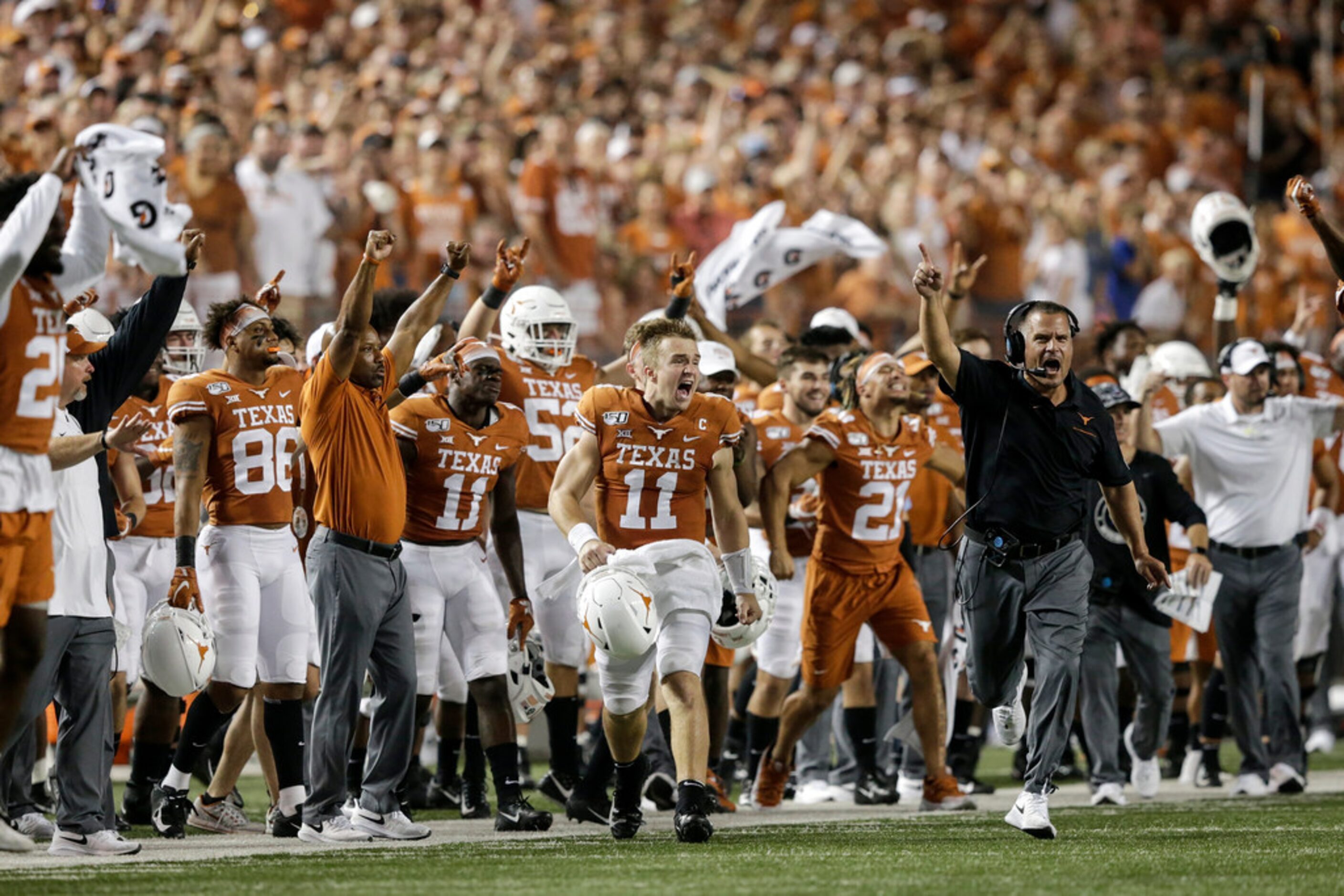 AUSTIN, TX - SEPTEMBER 21:  Sam Ehlinger #11 of the Texas Longhorns reacts after a missed...