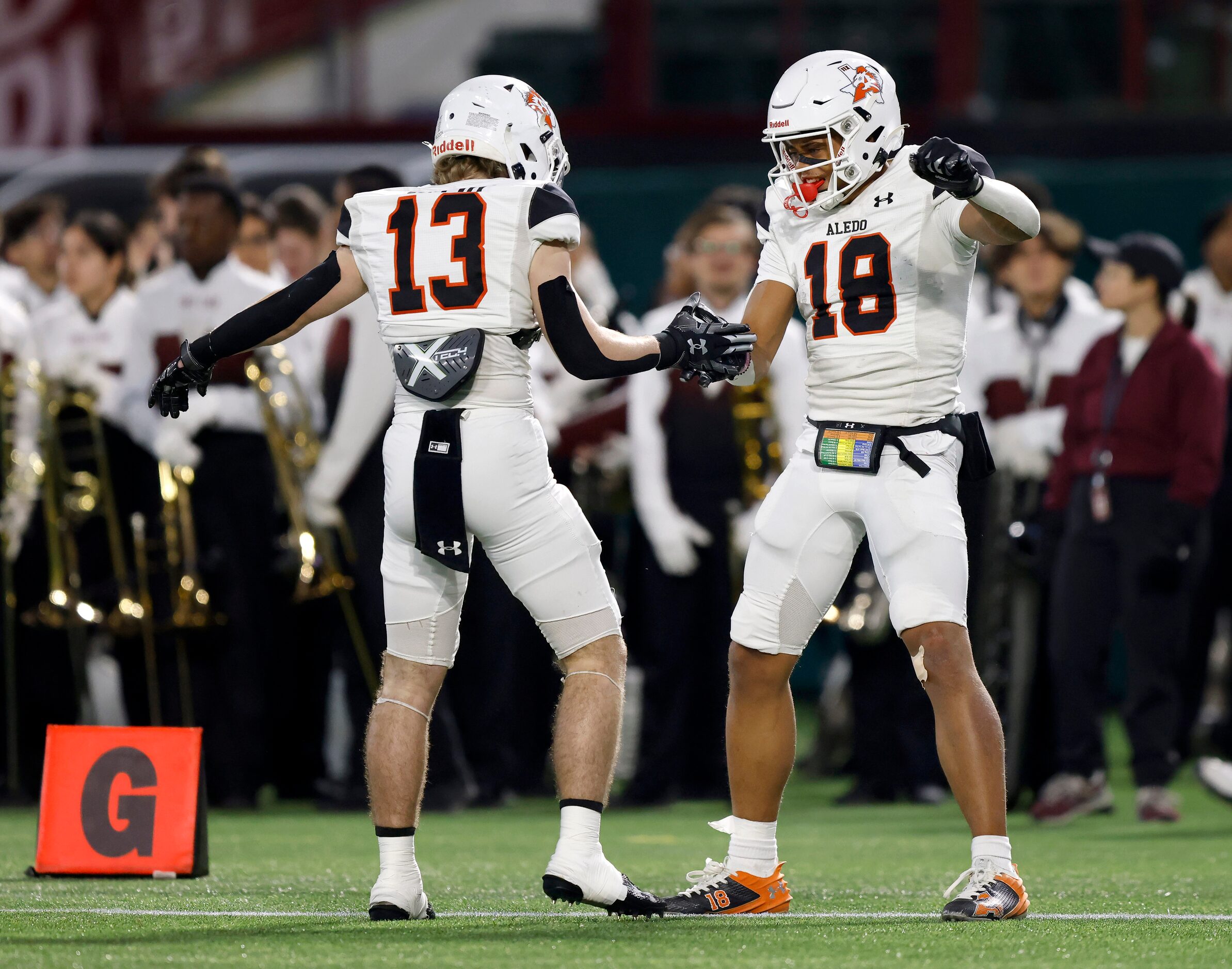 Aledo wide receiver Kaydon Finley (18) celebrates his second quarter touchdown catch with...