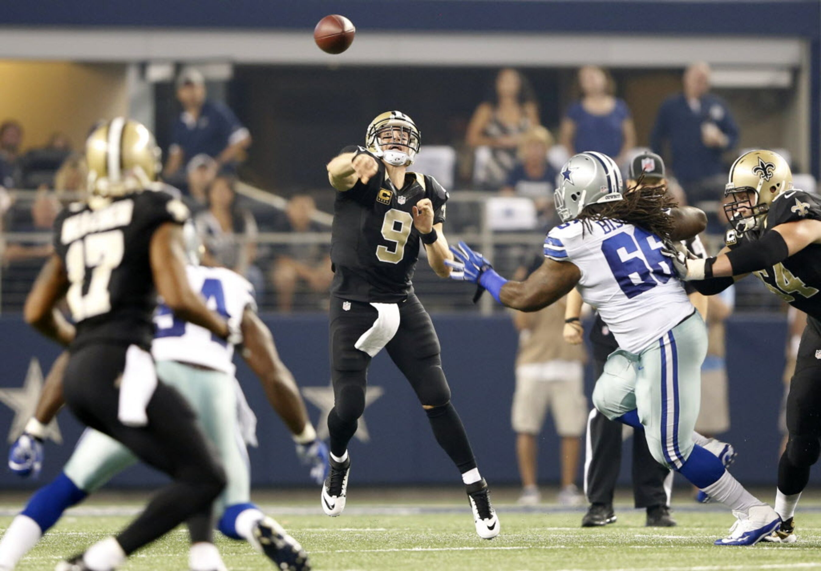 New Orleans Saints quarterback Drew Brees (9) attempts to pass in a game against the Dallas...