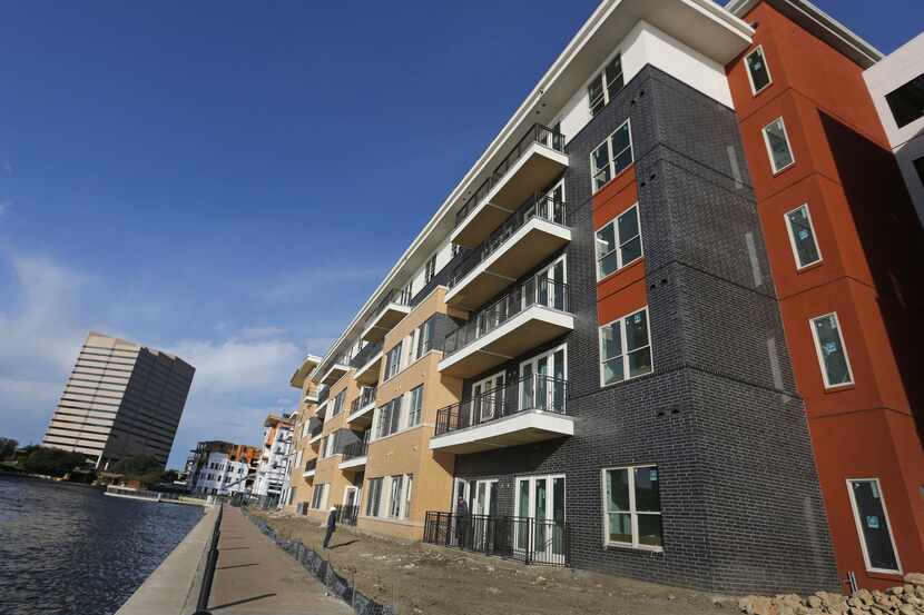 The first lakeside apartments are open in the Water Street development in Las Colinas.