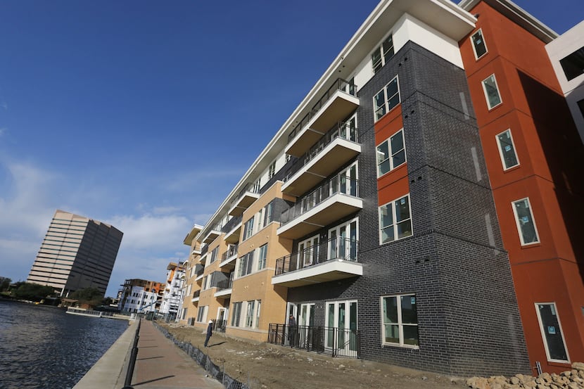 The first lakeside apartments are open in the Water Street development in Las Colinas.