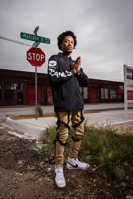 Bobby Sessions poses along Malcolm X Boulevard in Deep Ellum on Thursday, Sept. 10.