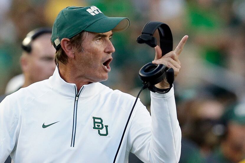Baylor coach Art Briles yells from the sideline during the first half of an NCAA college...