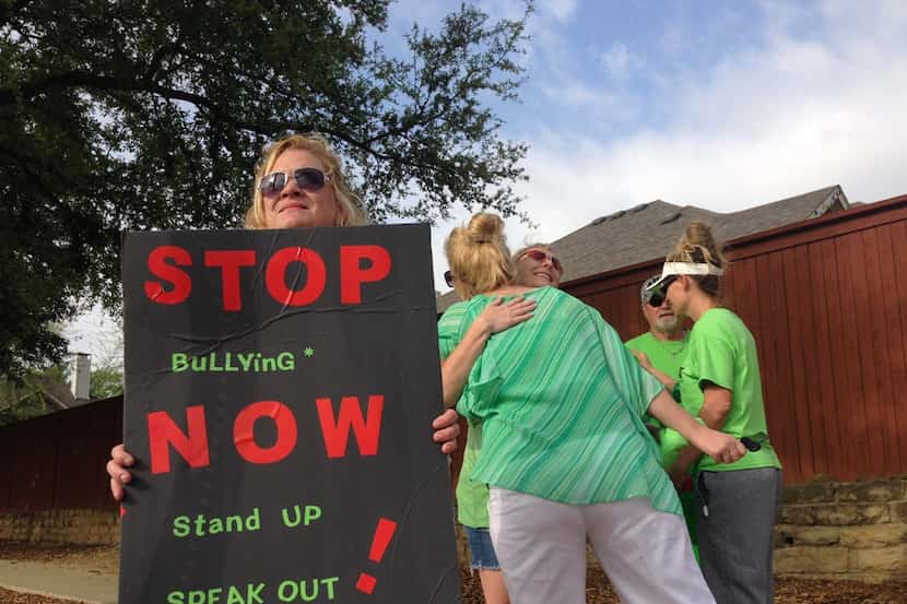  Tami Turner of McKinney rallied with others against bullying outside McKinney Boyd High...