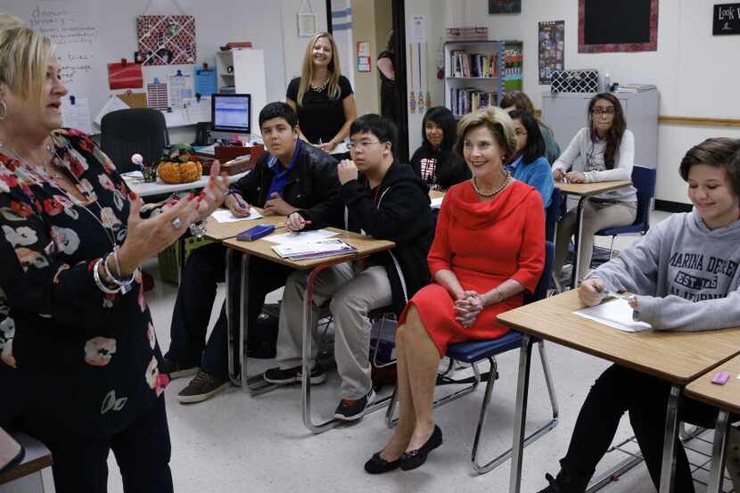 Former first lady Laura Bush attends an English Gifted and Talented class with 8th graders...