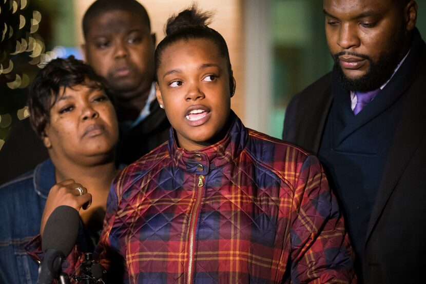 Jacqueline Craig (left) listens as her 19-year-old daughter Brea Hymond addresses the media...