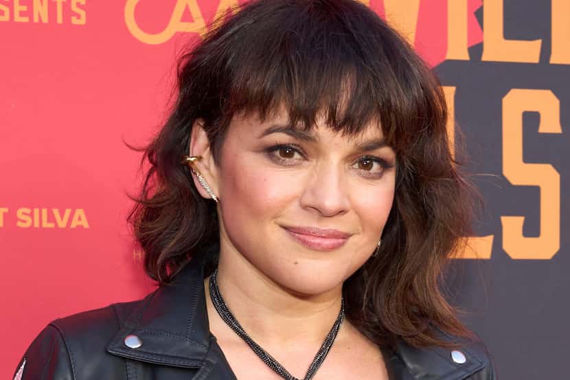Norah Jones arrives at an event celebrating Willie Nelson's 90th birthday, on April 29,...