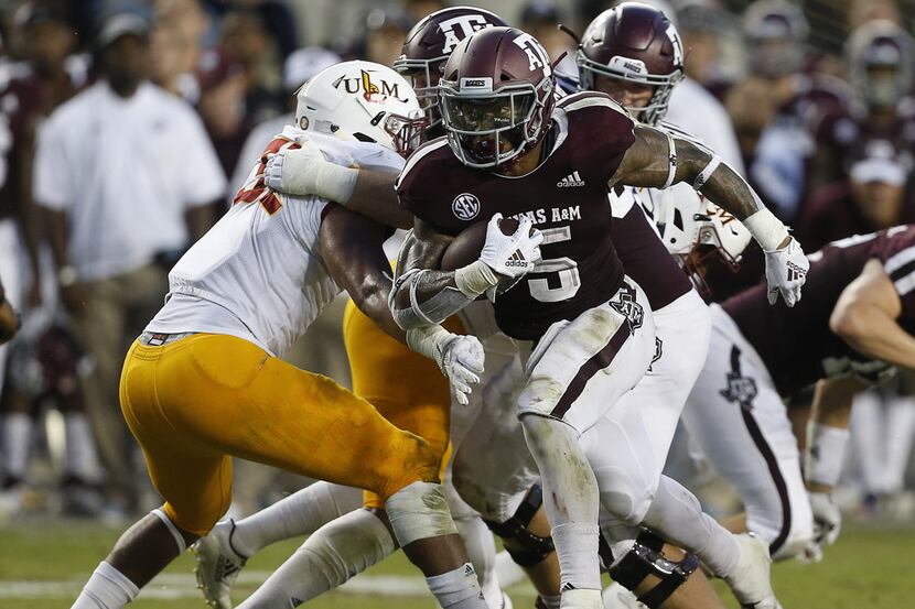 COLLEGE STATION, TX - SEPTEMBER 15:  Trayveon Williams #5 of the Texas A&M Aggies rushes...