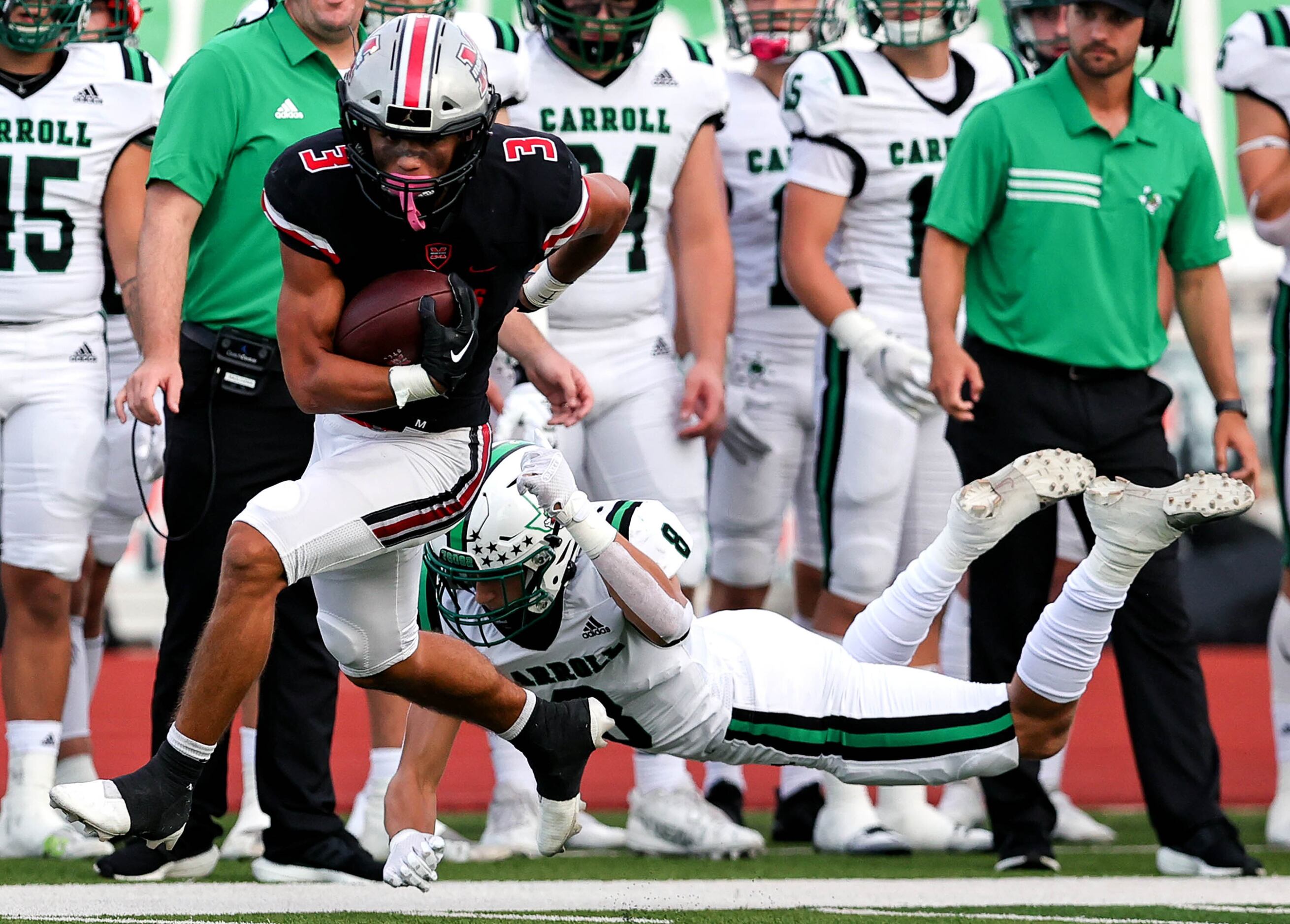 Flower Mound Marcus running back Chance Sautter (3) breaks free from Southlake Carroll...