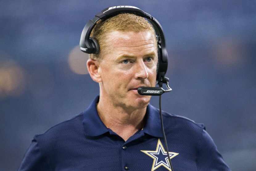 Dallas Cowboys head coach Jason Garrett watches from the sidelines during the second quarter...