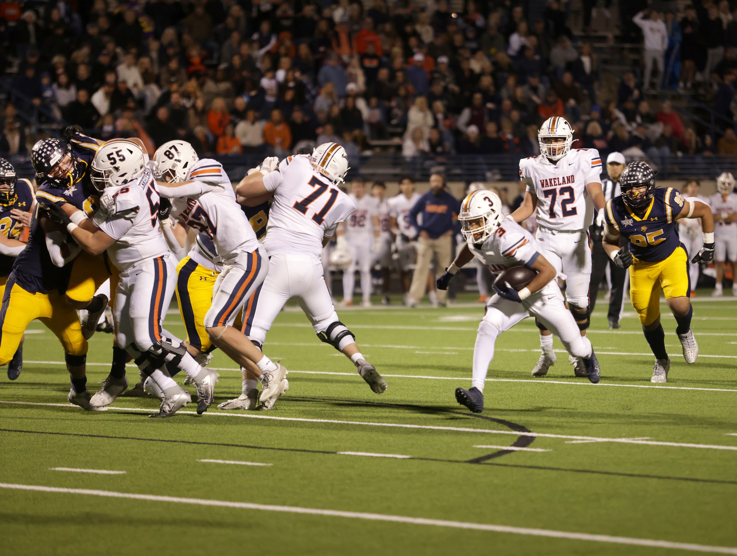 Frisco Wakeland's Aidan Poole finds a gap in a football playoff game against Highland Park...