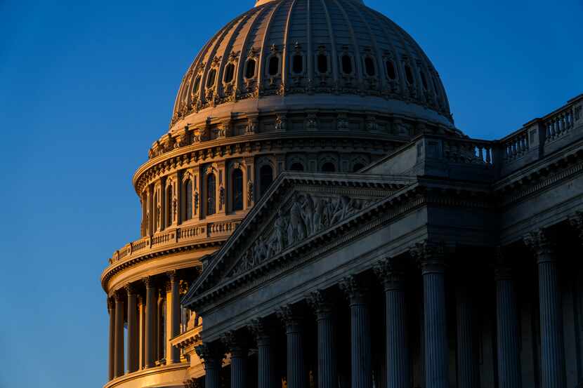 FILE - Sunrise at the U.S. Capitol, Monday, Dec. 19, 2022 in Washington. The House and the...