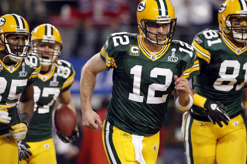 Green Bay Packers quarterback Aaron Rodgers (12) and his ofense score against the Pittsburgh...
