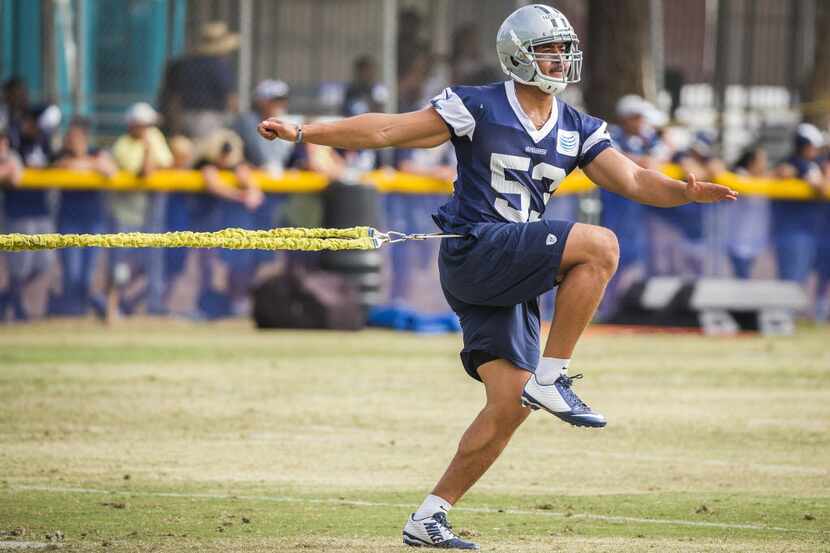 Dallas Cowboys outside linebacker Mark Nzeocha works on condition during afternoon practice...