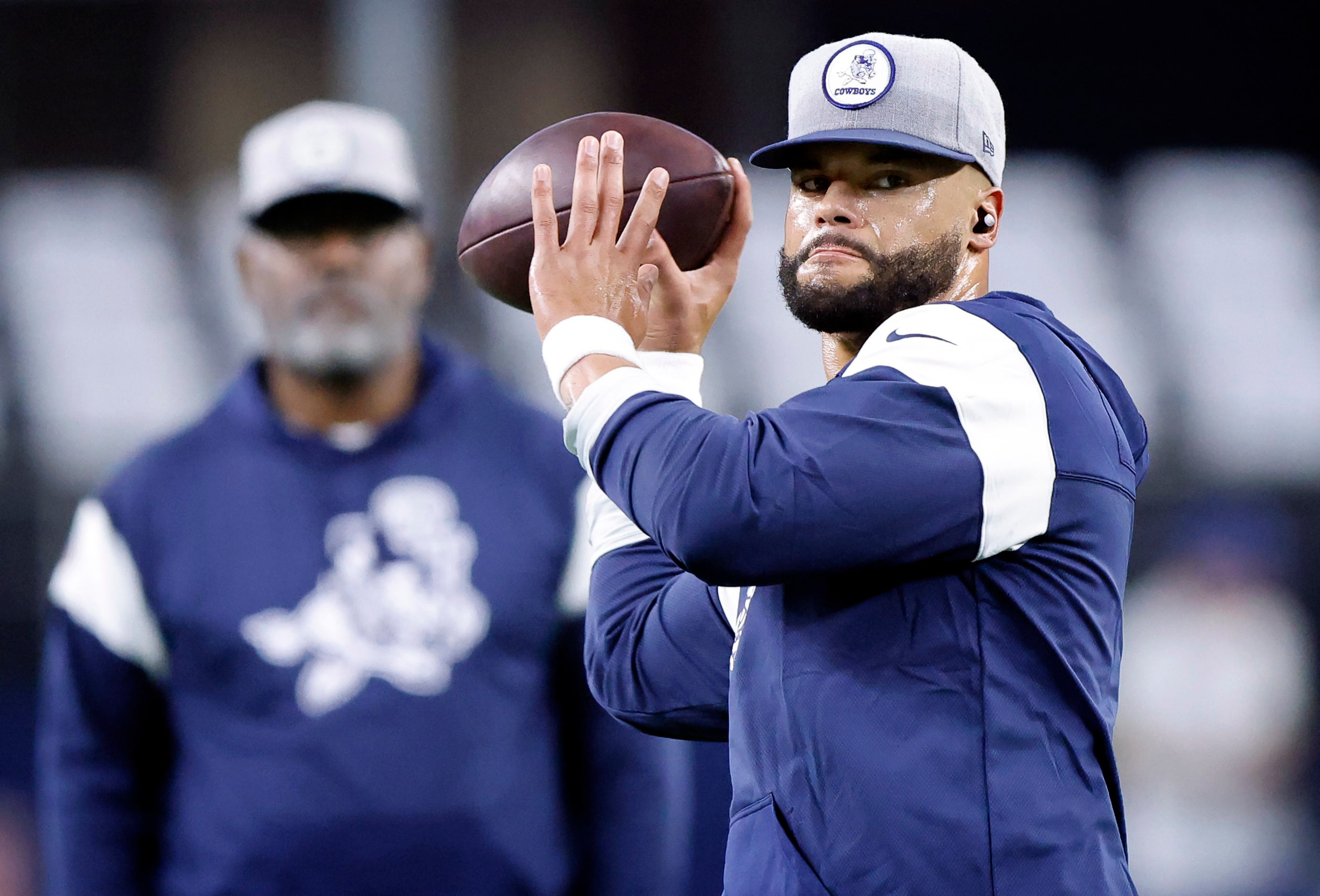 Dallas Cowboys quarterback Dak Prescott (4) throws passes during pregame warmups before the...