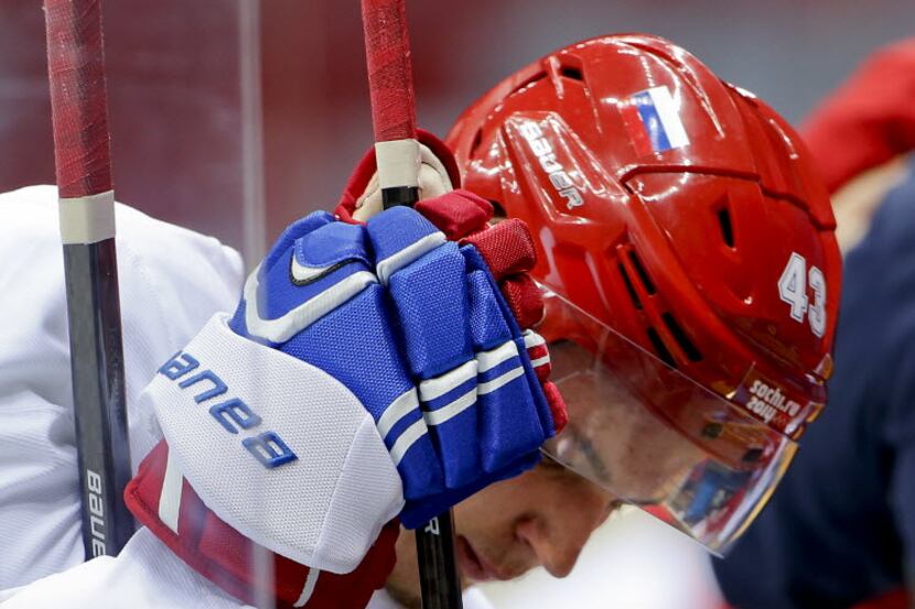 Russia forward Valeri Nichushkin prepares to climb into the rink at the Bolshoy Ice Dome at...
