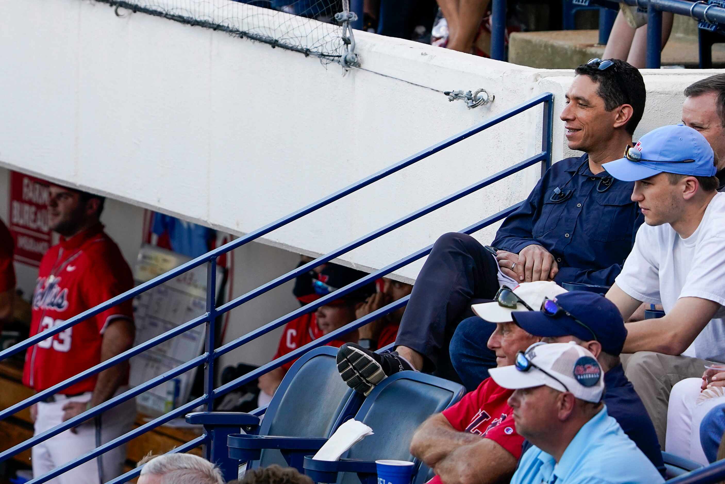 Texas Ranges president, baseball operations, Jon Daniels  watches an NCAA baseball game...