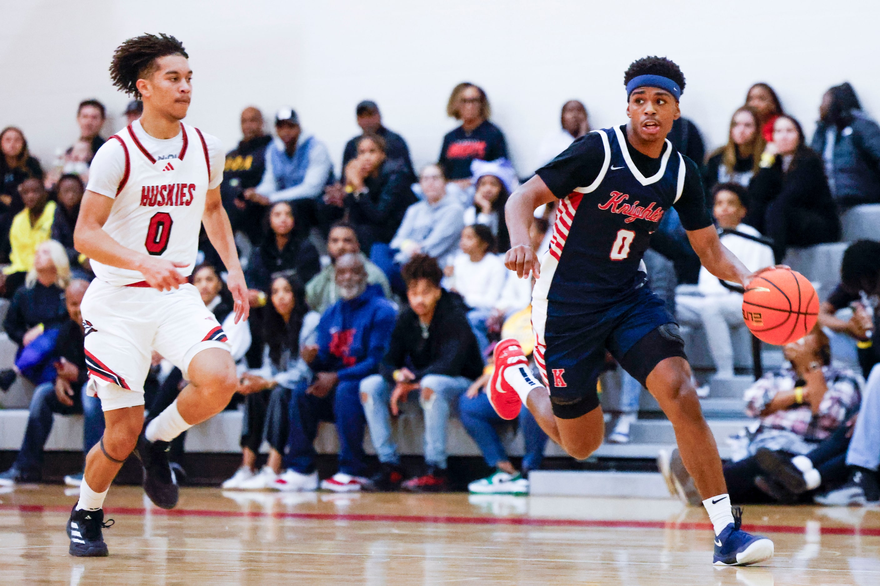 Kimball High’s Kayden Gray (0) dribbles past Kai Pattonof Centennial High of California...