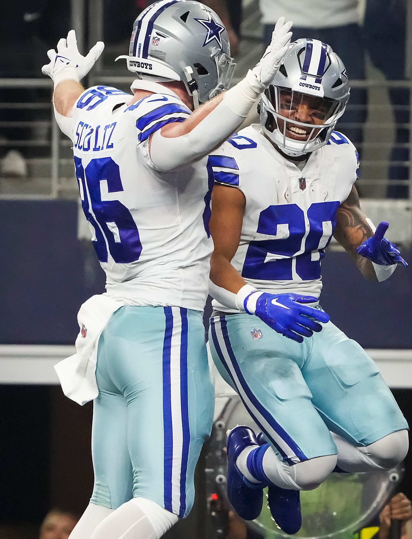 Dallas Cowboys running back Tony Pollard (20) celebrates after a touchdown run with tight...