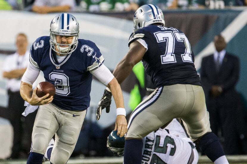 Dallas Cowboys quarterback Brandon Weeden (3) runs the ball as Dallas Cowboys tackle Tyron...
