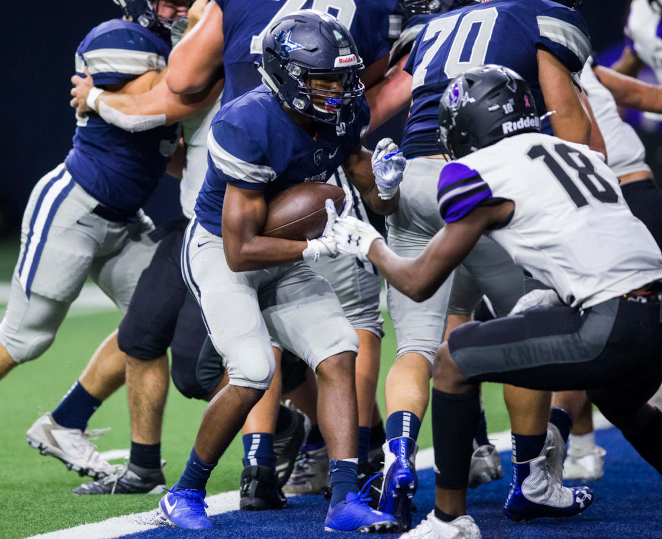 .Frisco Lone Star running back Jaden Nixon (5) gets across the goal line for a touchdown...