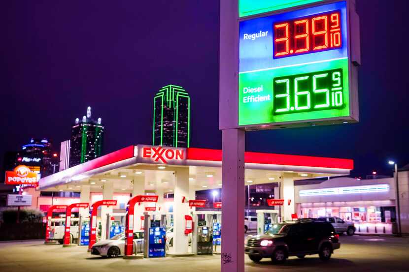 Gas prices are displayed at an Exxon station at Riverfront and Continental near downtown...