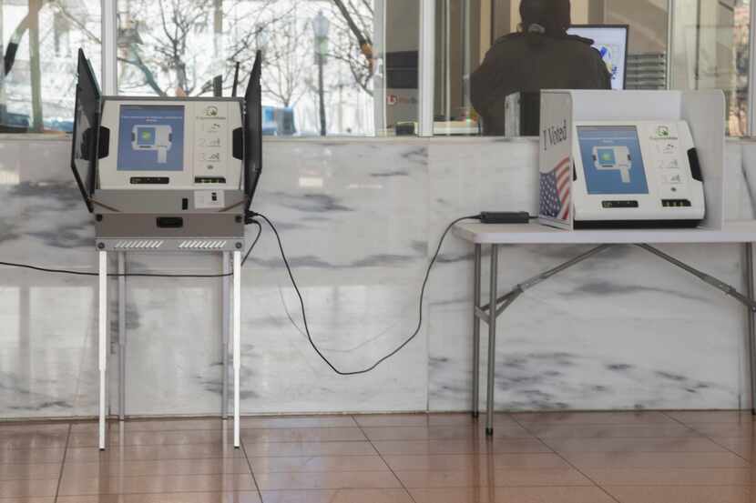 Voting machines at the George L. Allen Sr. Courts Building on Feb. 20, 2024, in Dallas....