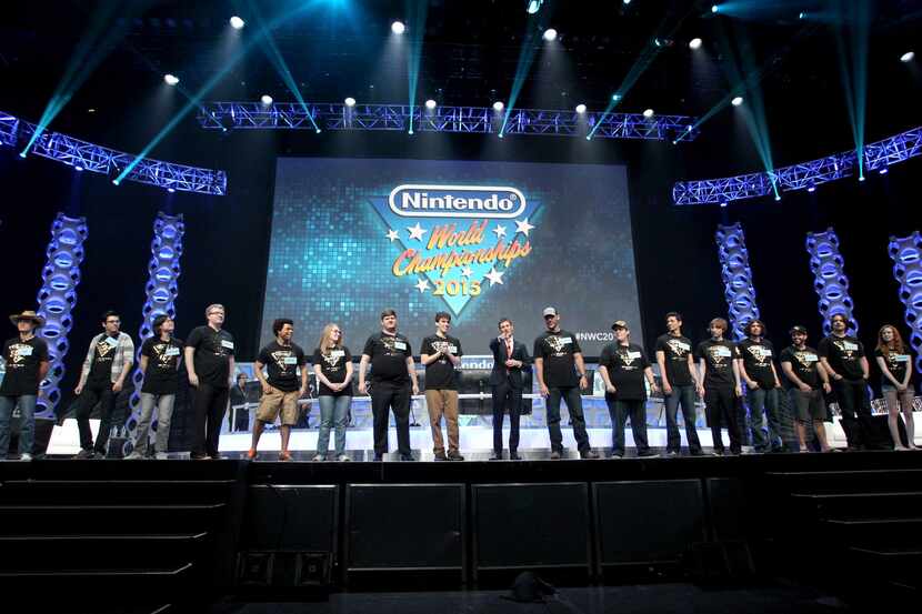 In this photo provided by Nintendo of America, host Kevin Pereira welcomes the enthusiastic...