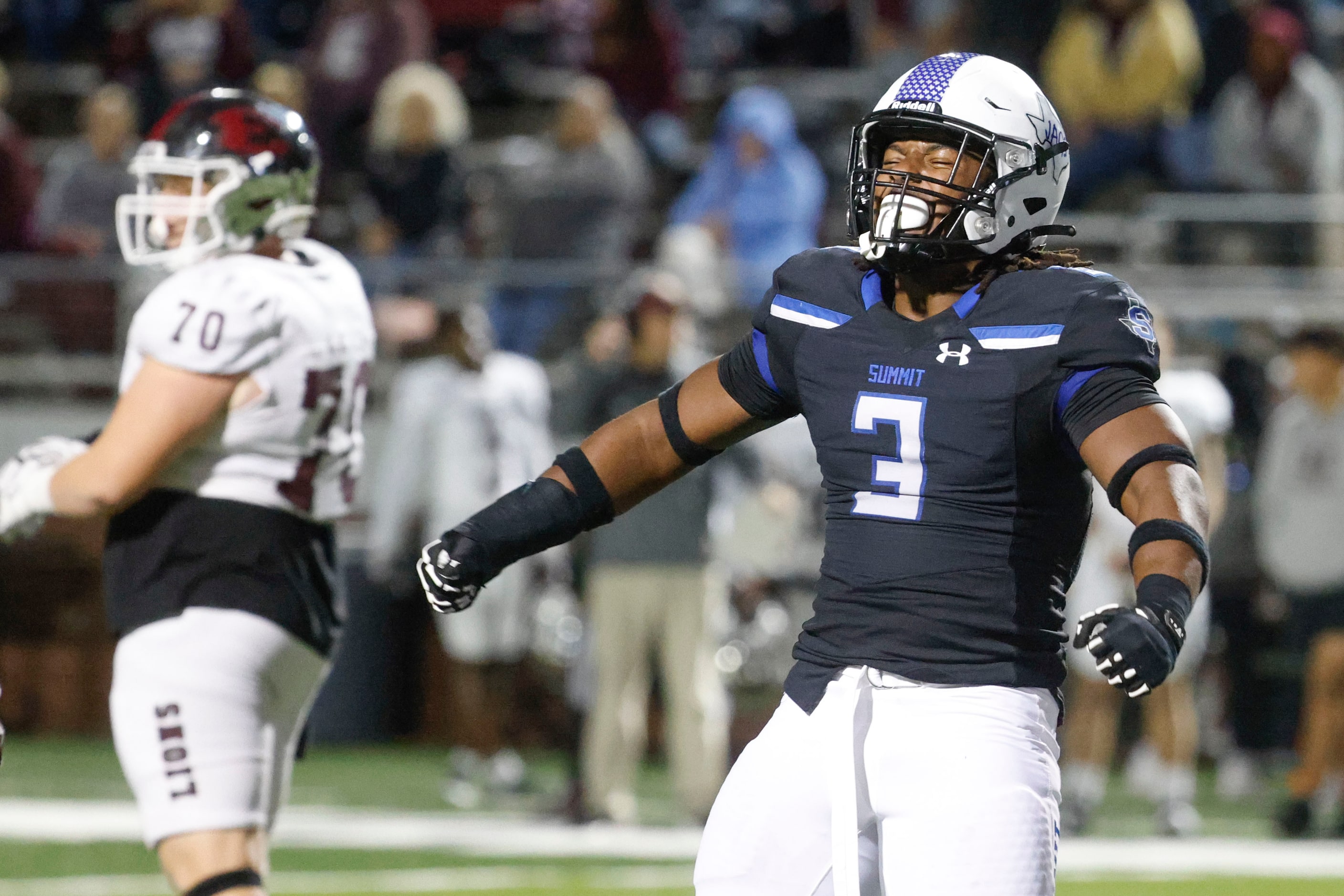 Mansfield Summit High’s Jordan Hubbard celebrates against Ennis High during the first half...