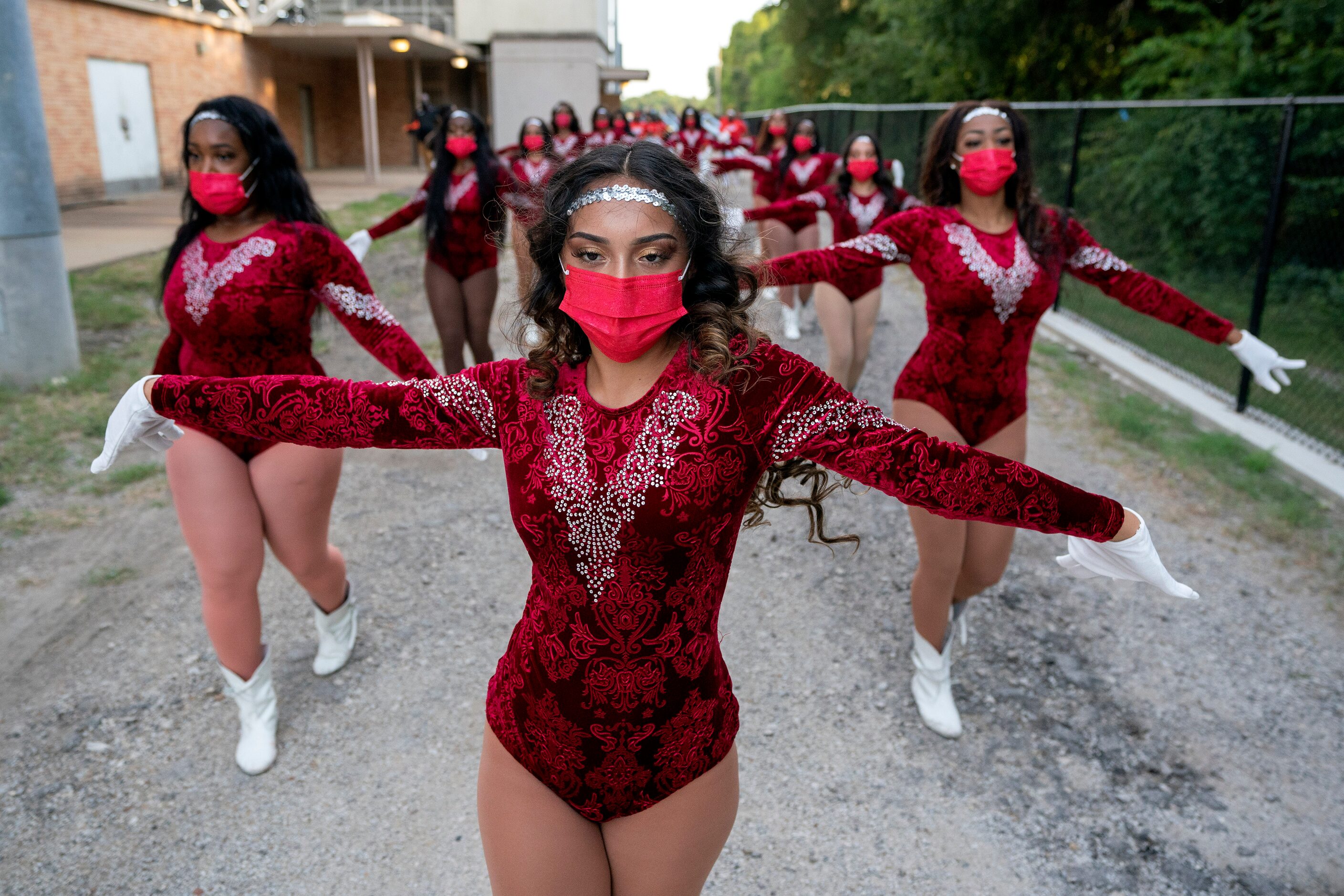 Alexia Aldaba, a captain of Skyline’s Silhouettes dance team leads her squad into the...