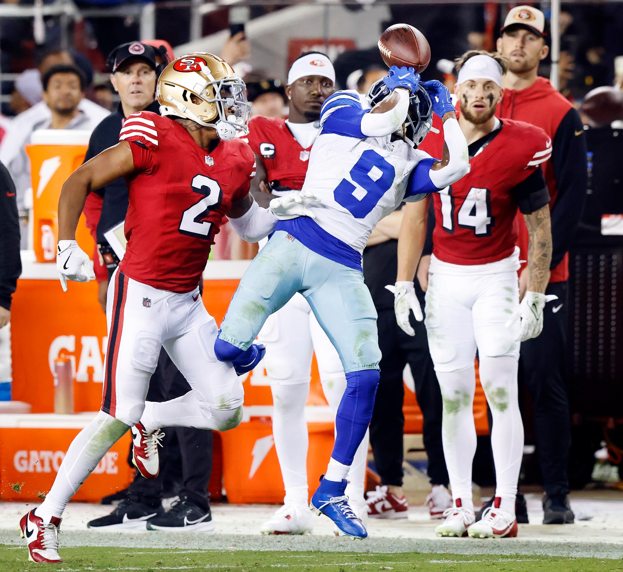 Dallas Cowboys wide receiver KaVontae Turpin (9) lets a long fourth quarter pass slip...