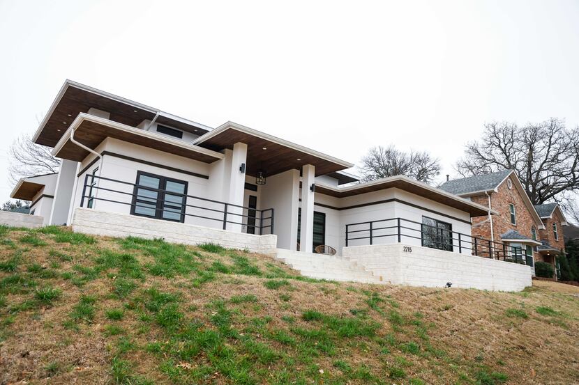Brian Embery and Jessica Salazar Embery bought a steel-framed house in Lewisville built by...