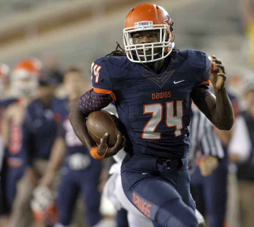 McKinney North running back Ronald Jones (24) races to the endzone on a 74-yard rush in the...