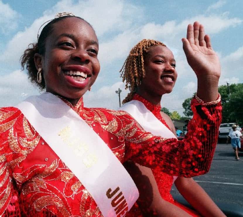  Keisha Hunter, Miss Juneteenth, and Tiffany Brooks, first runner-up, rode in a parade in...