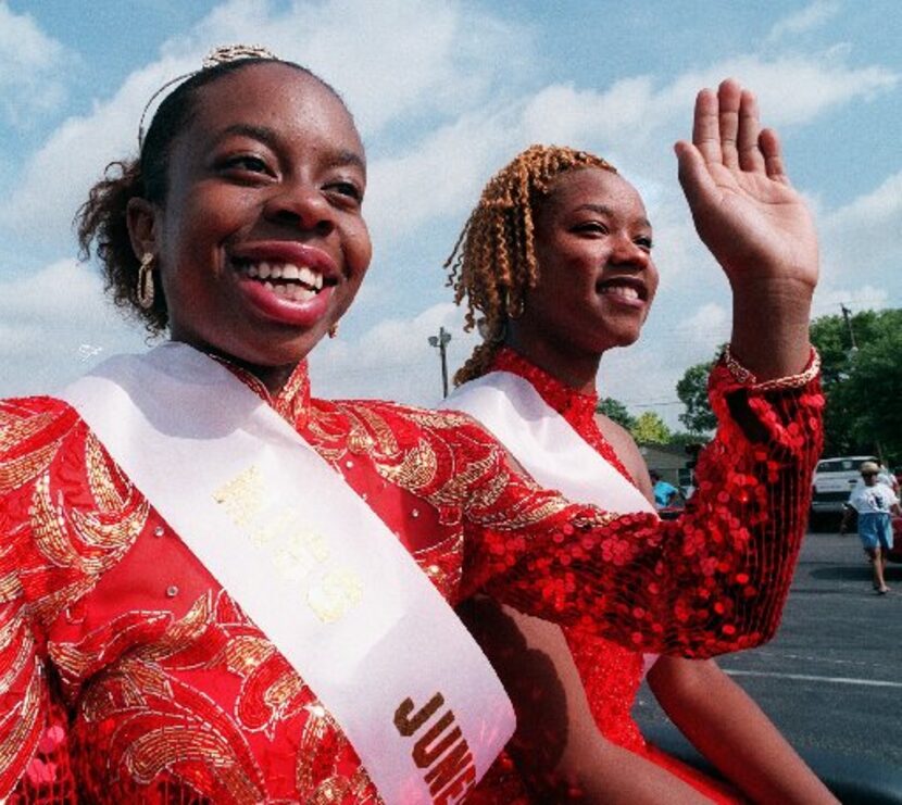  Keisha Hunter, Miss Juneteenth, and Tiffany Brooks, first runner-up, rode in a parade in...