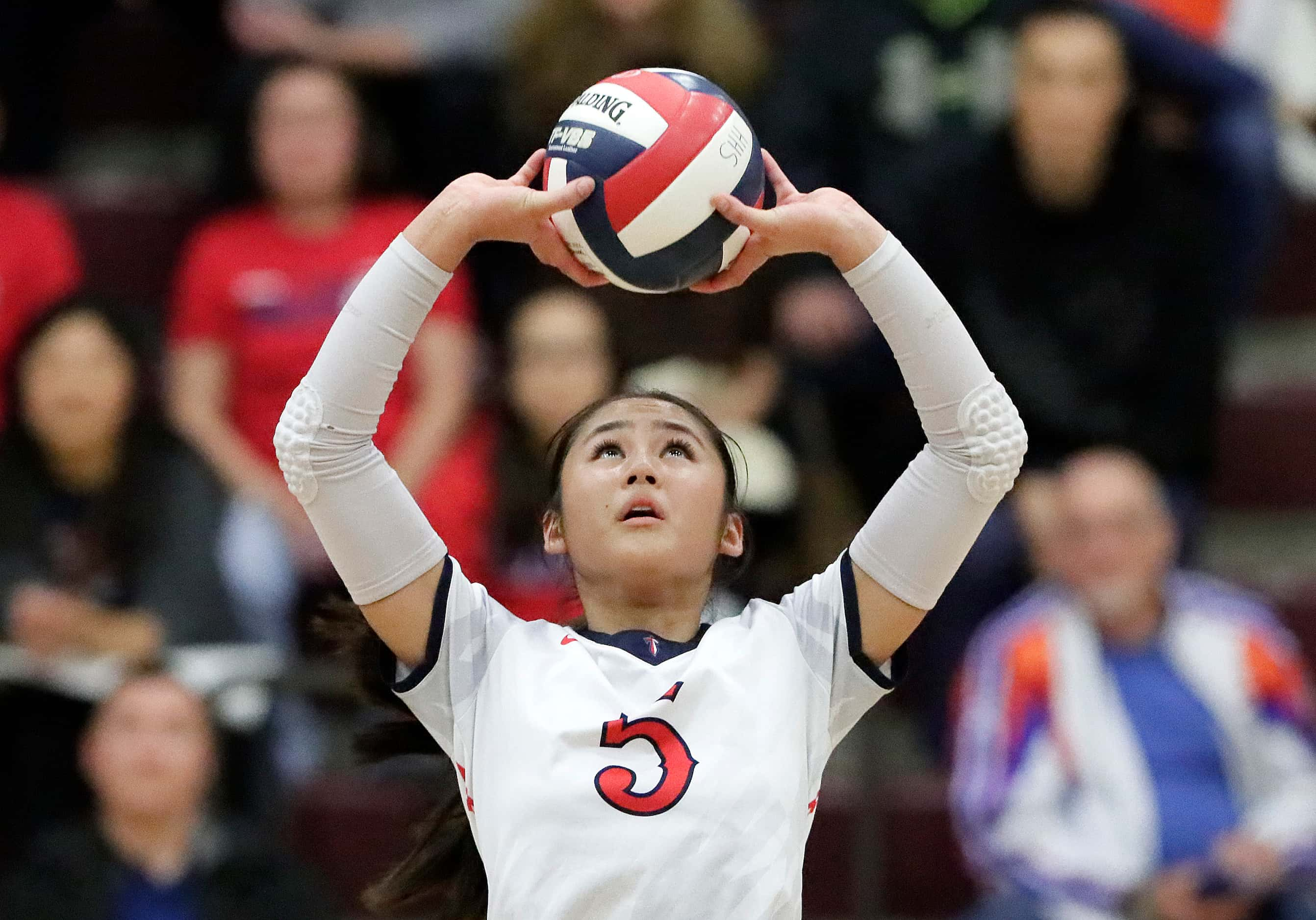 Centennial High School setter Madison Victoriano (5) makes set during game two as Wakeland...